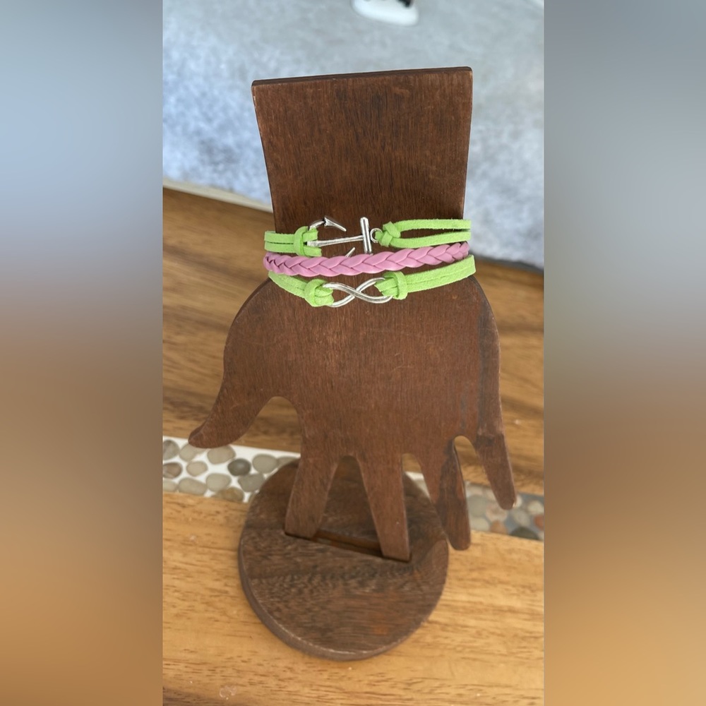 Green & pink Braided leather multi strand love themed bracelet